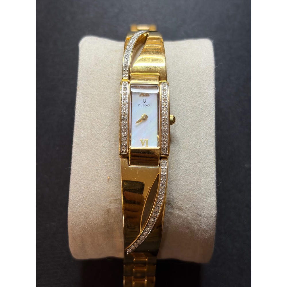 Bulova Bangle Watch Women Gold Mother of Pearl Crystal C865136 Dress